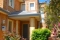 Brick & tile front portico with ceiling by Castlegate Home Improvements