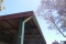 New gutter and down pipe on an old patio makes a big difference