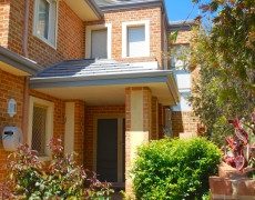 Brick & tile front portico with ceiling by Castlegate Home Improvements